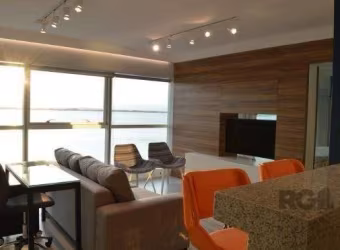 Apartamento na Zona Sul com vista para o Guaiba com 1 suíte com closet e varanda, 1 vaga de garagem, living inegrado a cozinha, area de serviço, semi-mobiliado.&lt;BR&gt;Condomínio com  Infraestrutura