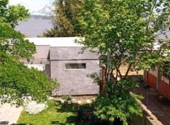 CASA 4 DORMITÓRIOS, 2 SUITES, OUTROS 2 DORMITÓRIOS COM UM BANHEIRO, LIVING INTEGRADO  COM JANTAR COM LAREIRA, LAVABO, COZINHA, SACADA. SALÃO DE FESTAS COM LAREIRA, ÁREA SERVIÇO, DEPENDÊNCIA EMPREGADA 