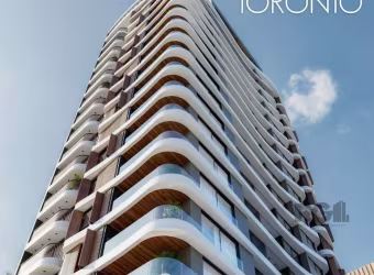 Apartamento em Torres com 71m² distribuidos em dois dormitórios sendo uma suite , banheiro social , living e sacada .