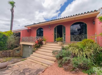 VENHA CONHECER ESSA LINDA CASA COM 360M2, COM 03 DORMITORIOS, SENDO UMA SUITE, AMPLA SALA COM DOIS AMBIENTES, PE DIREITO ALTO, LAREIRA, ESCRITORIO, DEPOSITO, AMPLO SALAO DE FESTAS  COM CHURRASQUEIRA,J