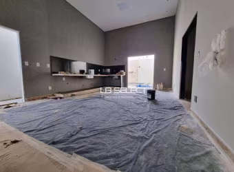 Casa alto padrão no bairro Jardim Botânico com três quartos e varanda gourmet completa.