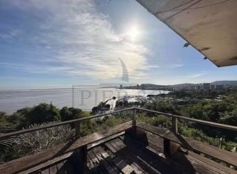Casa com 5 quartos à venda na Rua Bororó, 699, Vila Assunção, Porto Alegre por R$ 1.910.000