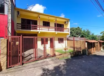 Casa 4 dormitórios à venda Vila Nova Porto Alegre/RS