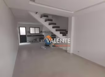 Sobrado com 3 dormitórios à venda, 108 m² por R$ 670.000,00 - Caiçara - Praia Grande/SP