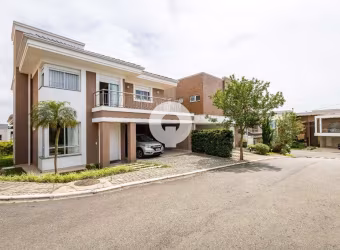 CASA EM CONDOMÍNIO COM 4 SUÍTES
