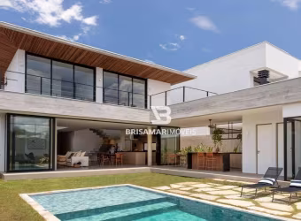 CASA DE ALTO PADRÃO EM CONDOMÍNIO PRIVILEGIADO NO GUARUJÁ – 5 SUÍTES, ÁREA GOURMET E BEACH HOUSE