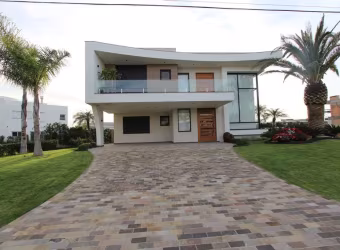 Casa em condomínio fechado com 4 quartos à venda na Rua Rio Jacuí, 1331, Atlântida, Xangri-Lá por R$ 3.710.000