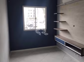 Seu Refúgio Acolhedor: Apartamento Térreo de 2 Dormitórios no Bairro Santos Dumont