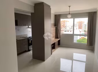 Apartamento com dois dormitórios e vaga de garagem em Porto Alegre.