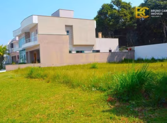 Terreno em condomínio fechado à venda, 300 m² por R$ 420.000 - Bougainvillee Residencial IV - Peruíbe/SP