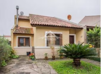 Casa em condomínio fechado com 3 quartos à venda na Rua Guatambu, 211, Hípica, Porto Alegre por R$ 470.000
