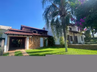 Sobrado com 3 dormitórios para alugar, 220 m² por R$ 6.753,00/mês - Centro - Gravataí/RS