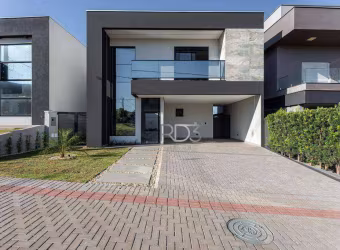 Sobrado com 3 dormitórios à venda, 196 m² por R$ 1.750.000,00 - Condomínio Parque Tauá - Araçari - Londrina/PR