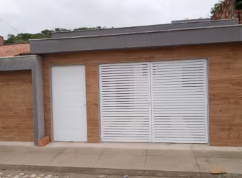 tres quartos, sala em dois ambientes , uma suíte, banheiro social, área externa, lavanderia externa e tapada, garagem para dois carros.