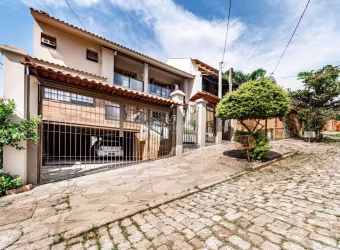 Casa com 3 quartos à venda na Rua Inês Vinhas, 45, Espírito Santo, Porto Alegre por R$ 1.040.000