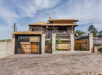Casa com 3 quartos à venda na Avenida Cai, 917, Cristal, Porto Alegre por R$ 1.980.000