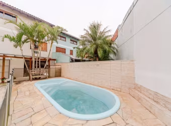 Casa com 3 quartos à venda na Rua Torre de Pedra, 78, Espírito Santo, Porto Alegre por R$ 980.000