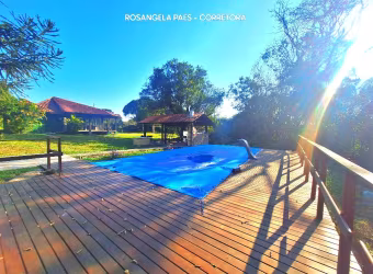 Um espetáculo de Chácara com piscina e aconchegante casa