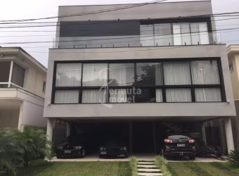 Edifício Reserva Alphasítio - Casa à venda com 500m², 4 suítes, sala de estar, cozinha, área de lazer e garagem no Condomínio Alphasitio