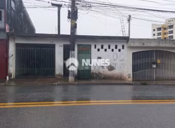 Terreno com casa antiga na Av Flora