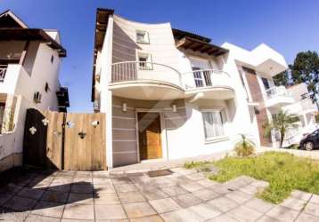 Casa em condomínio fechado com 3 quartos à venda na avenida edgar pires de castro, 540, hípica, porto alegre por r$ 1.100.000