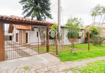 Casa em condomínio fechado com 4 quartos à venda na avenida guarujá, 199, guarujá, porto alegre, 226 m2 por r$ 580.000