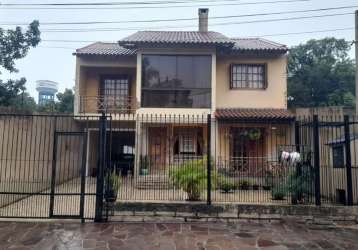 Casa em condomínio fechado com 3 quartos à venda na rua poncalino cardoso da silva, 265, centro, viamão, 300 m2 por r$ 680.000