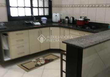 Casa em condomínio fechado com 3 quartos à venda na rua chile, 661, jardim universitário, viamão, 160 m2 por r$ 430.000