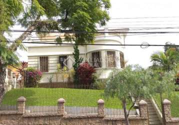 Casa em condomínio fechado com 3 quartos à venda na rua guilherme schell, 209, santo antônio, porto alegre, 377 m2 por r$ 1.720.000