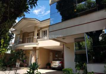 Casa com 2 quartos à venda na rua fernando abbott, 1062, cristo redentor, porto alegre, 565 m2 por r$ 2.600.000