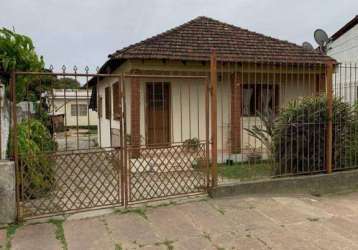 Vendo terreno com 400m² com 2 casas com dois dormitórios cada.