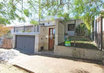 Casa com 3 quartos à venda na rua gustavo schmidt, 615, três figueiras, porto alegre, 309 m2 por r$ 1.400.000