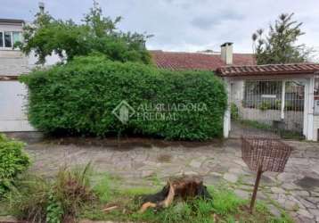 Casa com 3 quartos à venda na rua mura, 145, guarujá, porto alegre, 316 m2 por r$ 590.000