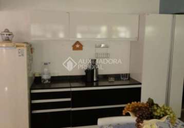 Casa em condomínio fechado com 3 quartos à venda na rua erechim, 293, nonoai, porto alegre, 158 m2 por r$ 550.000