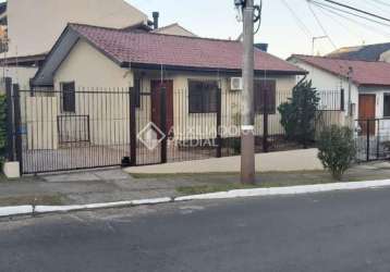 Casa com 2 quartos à venda na rua canários, 1232, jardim algarve, alvorada, 68 m2 por r$ 339.900