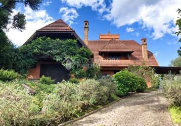 Casa em condomínio fechado com 4 quartos à venda na edelweis, 168, moura, gramado, 386 m2 por r$ 3.900.000