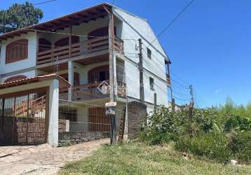 Casa com 1 quarto à venda na rua taveira júnior, 471, nonoai, porto alegre, 2500 m2 por r$ 1.200.000