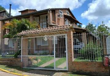 Casa em condomínio fechado com 4 quartos à venda na rua mogno, 24, cantegril, viamão, 190 m2 por r$ 550.000