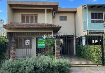 Casa em condomínio fechado com 3 quartos à venda na rua felipe de oliveira, 85, harmonia, canoas, 69 m2 por r$ 520.000