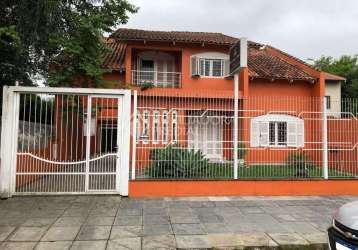 Casa em condomínio fechado com 5 quartos à venda na rua dom pedro ii, 622, nossa senhora das graças, canoas, 258 m2 por r$ 1.537.000