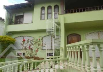 Casa em condomínio fechado com 4 quartos à venda na rua tietê, 375, igara, canoas, 220 m2 por r$ 1.500.000