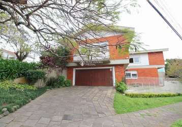 Casa com 5 quartos à venda na rua felipe becker, 178, três figueiras, porto alegre, 387 m2 por r$ 2.500.000