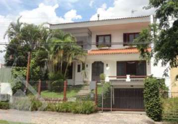 Casa em condomínio fechado com 3 quartos à venda na beco circular, 117, vila jardim, porto alegre, 395 m2 por r$ 1.820.000