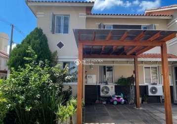 Casa em condomínio fechado com 3 quartos à venda na avenida adelino ferreira jardim, 140, rubem berta, porto alegre, 116 m2 por r$ 410.000