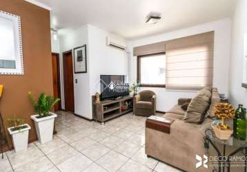 Apartamento com 2 quartos à venda na rua taveira júnior, 164, nonoai, porto alegre, 59 m2 por r$ 245.000