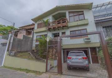 Casa com 4 quartos à venda na rua professor abílio azambuja, 136, jardim do salso, porto alegre, 425 m2 por r$ 1.911.000