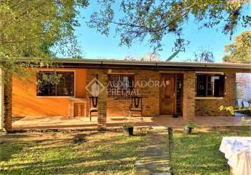 Casa em condomínio fechado com 4 quartos à venda na avenida desembargador mello guimarães, 235, belém novo, porto alegre, 181 m2 por r$ 750.000