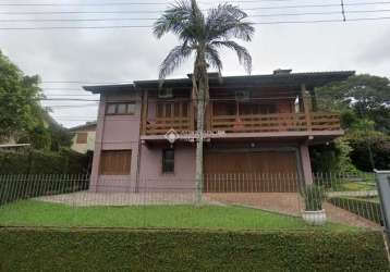 Casa com 4 quartos à venda na rua tubarão, 433, primavera, novo hamburgo, 267 m2 por r$ 790.000