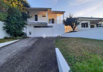 Casa com 3 quartos à venda na rua doutor miguel vieira ferreira, 20, petrópolis, novo hamburgo, 176 m2 por r$ 650.000