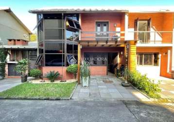 Casa em condomínio fechado com 2 quartos à venda na rua joão wendelino hennemann, 444, rondônia, novo hamburgo, 98 m2 por r$ 375.000